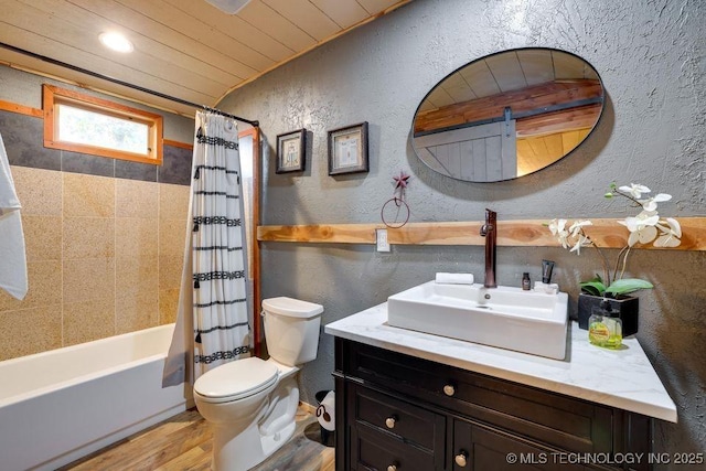 62141 E 313th Rd Unit 3, Grove, OK 74344 - full bathroom featuring vanity, wood finished floors, a textured wall, and shower / bath combo