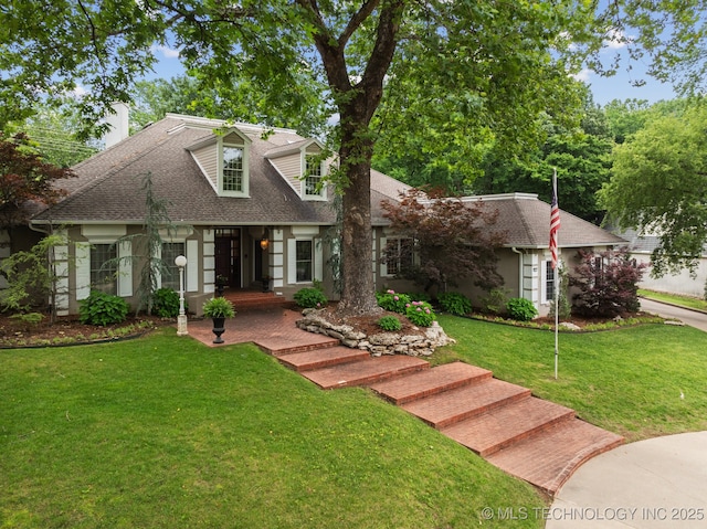 3431 E 96th Pl, Tulsa, OK 74137 - new england style home featuring a shingled roof, a front yard, and a chimney