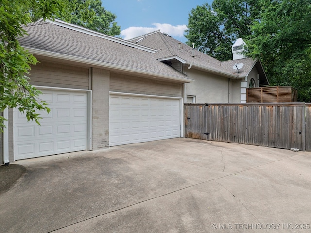 3431 E 96th Pl, Tulsa, OK 74137 - garage with concrete driveway