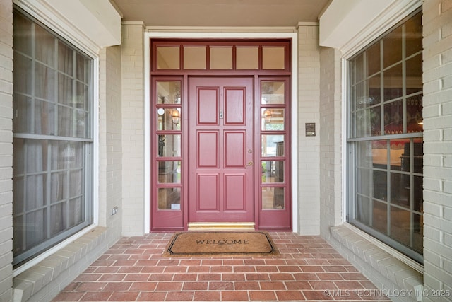 3431 E 96th Pl, Tulsa, OK 74137 - doorway to property featuring brick siding
