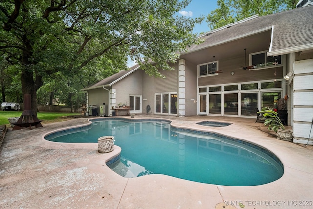 3431 E 96th Pl, Tulsa, OK 74137 - outdoor pool featuring a hot tub and a patio area