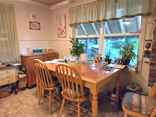 92133 S 4676th Rd, Bunch, OK 74931 - dining area featuring ornamental molding and light tile patterned floors