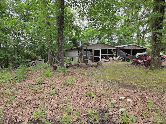 92133 S 4676th Rd, Bunch, OK 74931 - back of house featuring an outbuilding