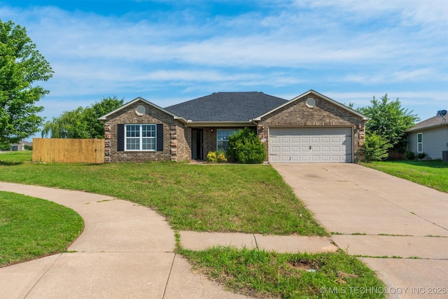 2708 W Fredericksburg St, Broken Arrow, OK 74011 - view of front facade with concrete driveway, a garage, and brick siding