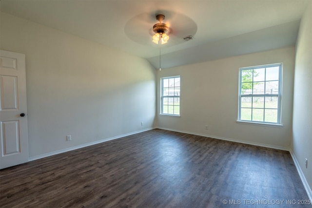 2708 W Fredericksburg St, Broken Arrow, OK 74011 - unfurnished room featuring healthy amount of natural light, dark wood-style floors, and a ceiling fan