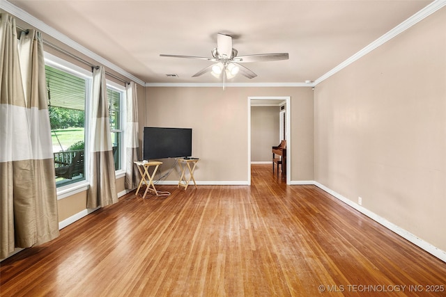 17997 S 4160th Rd W, Claremore, OK 74017 - unfurnished living room featuring wood finished floors, ornamental molding, and ceiling fan