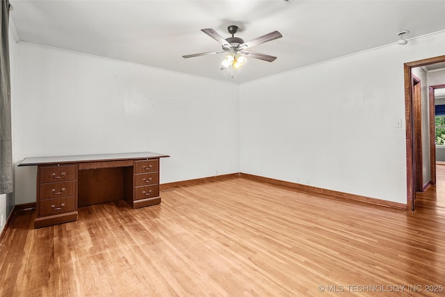 17997 S 4160th Rd W, Claremore, OK 74017 - spare room featuring light wood finished floors, ceiling fan, ornamental molding, and a desk