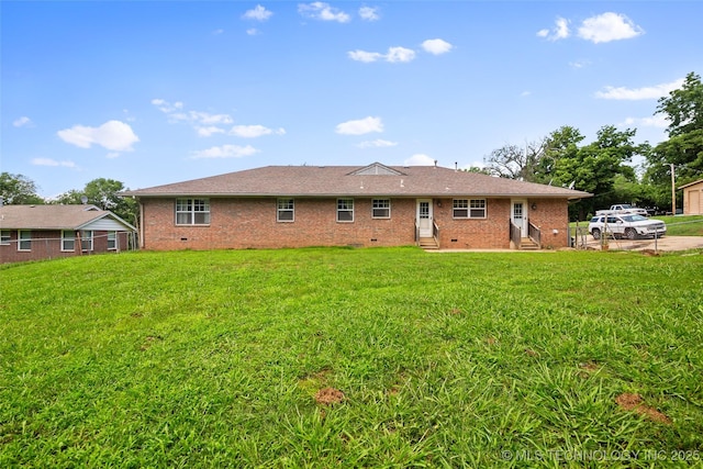 17997 S 4160th Rd W, Claremore, OK 74017 - back of property featuring entry steps, brick siding, and a yard