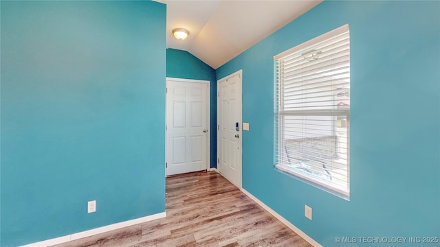 15081 S 276th E Ave, Broken Arrow, OK 74429 - entryway featuring vaulted ceiling and wood finished floors
