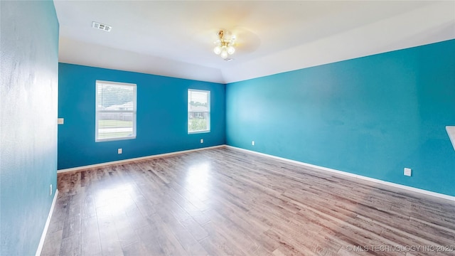 15081 S 276th E Ave, Broken Arrow, OK 74429 - unfurnished room with wood finished floors and a ceiling fan