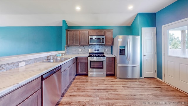 15081 S 276th E Ave, Broken Arrow, OK 74429 - kitchen with appliances with stainless steel finishes, decorative backsplash, light wood-style flooring, and recessed lighting
