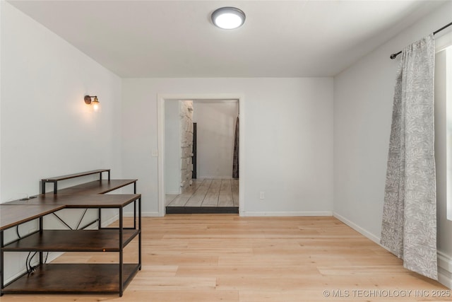 29012 E 63rd St, Broken Arrow, OK 74014 - unfurnished dining area featuring light wood-style flooring and baseboards