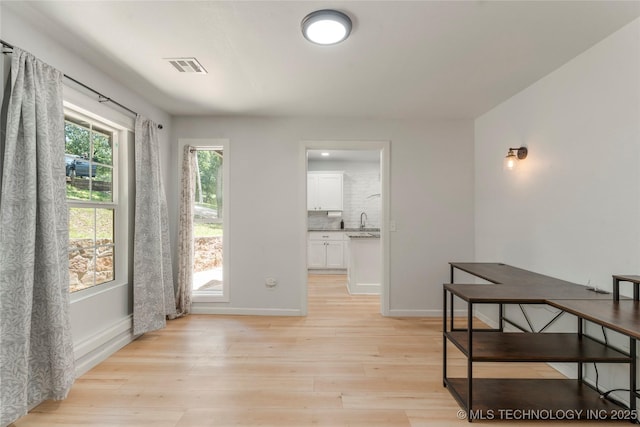 29012 E 63rd St, Broken Arrow, OK 74014 - dining room featuring light wood-style floors and baseboards