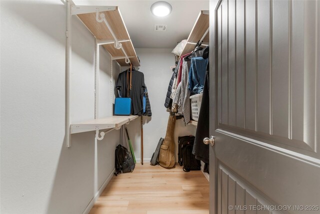 29012 E 63rd St, Broken Arrow, OK 74014 - walk in closet with wood finished floors