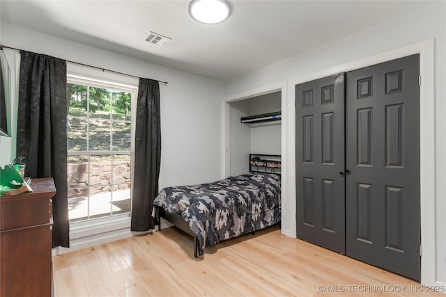 29012 E 63rd St, Broken Arrow, OK 74014 - bedroom featuring light wood finished floors