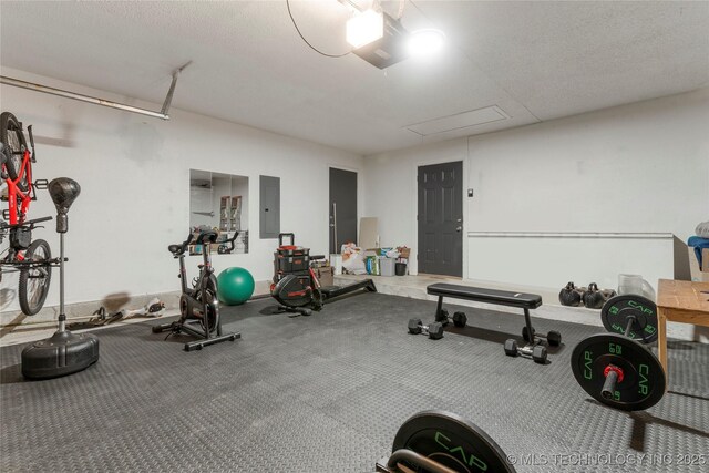 29012 E 63rd St, Broken Arrow, OK 74014 - exercise room with electric panel and attic access