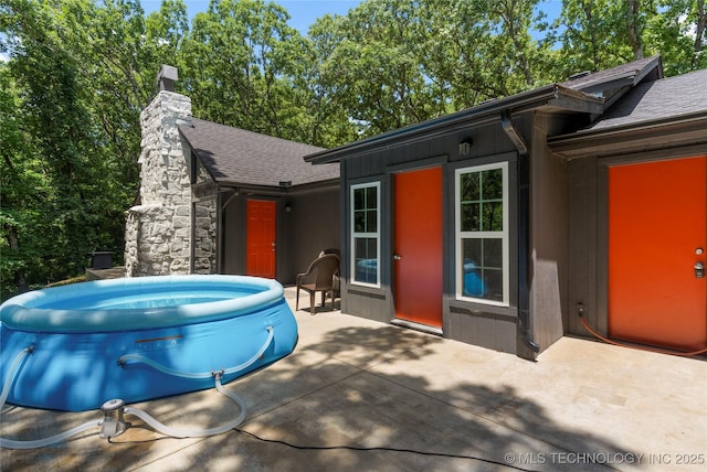 29012 E 63rd St, Broken Arrow, OK 74014 - view of front of property featuring a shingled roof and a chimney