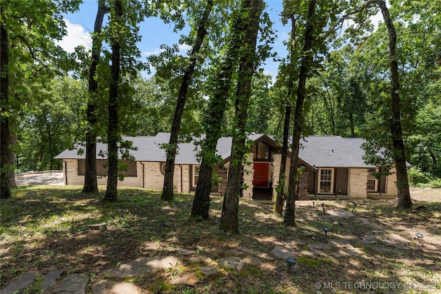 29012 E 63rd St, Broken Arrow, OK 74014 - view of front of property with stone siding and roof with shingles