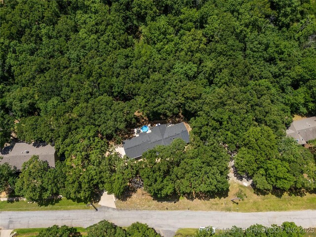 29012 E 63rd St, Broken Arrow, OK 74014 - view of property location with a heavily wooded area