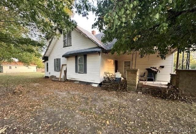 1101 N Collins Ave, Okmulgee, OK 74447 - rear view of property