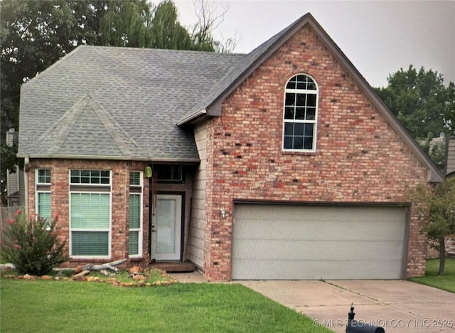 1714 W El Paso Pl, Broken Arrow, OK 74012 - view of front of home featuring brick siding, driveway, a front yard, a shingled roof, and a garage