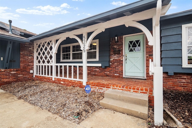 5225 S Toledo Ave, Tulsa, OK 74135 - doorway to property featuring a porch