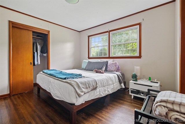 5225 S Toledo Ave, Tulsa, OK 74135 - bedroom with wood finished floors, crown molding, and a closet