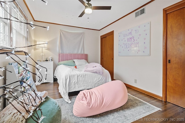 5225 S Toledo Ave, Tulsa, OK 74135 - bedroom featuring wood finished floors, ornamental molding, ceiling fan, and a closet