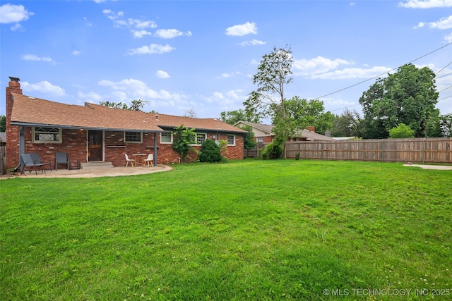 5225 S Toledo Ave, Tulsa, OK 74135 - view of yard featuring a patio and entry steps