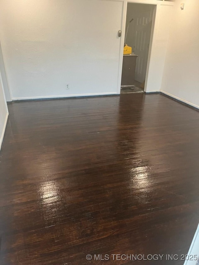 334 W 47th St N, Tulsa, OK 74126 - empty room featuring dark wood-type flooring