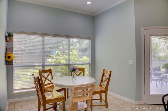 14230 S Urbana Ave, Bixby, OK 74008 - dining area with baseboards and ornamental molding