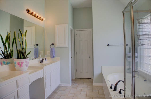 14230 S Urbana Ave, Bixby, OK 74008 - bathroom featuring a garden tub, double vanity, and a shower stall