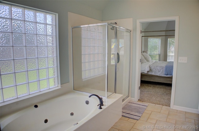 14230 S Urbana Ave, Bixby, OK 74008 - bathroom with connected bathroom, a whirlpool tub, a shower stall, plenty of natural light, and vaulted ceiling