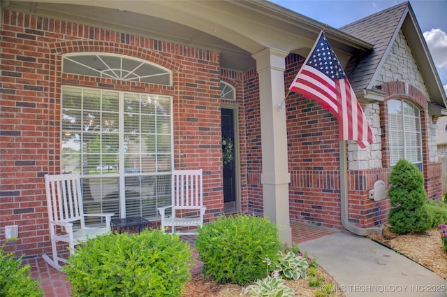 14230 S Urbana Ave, Bixby, OK 74008 - property entrance with brick siding and covered porch