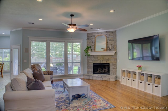 14230 S Urbana Ave, Bixby, OK 74008 - living room with a ceiling fan, crown molding, a fireplace, wood finished floors, and recessed lighting