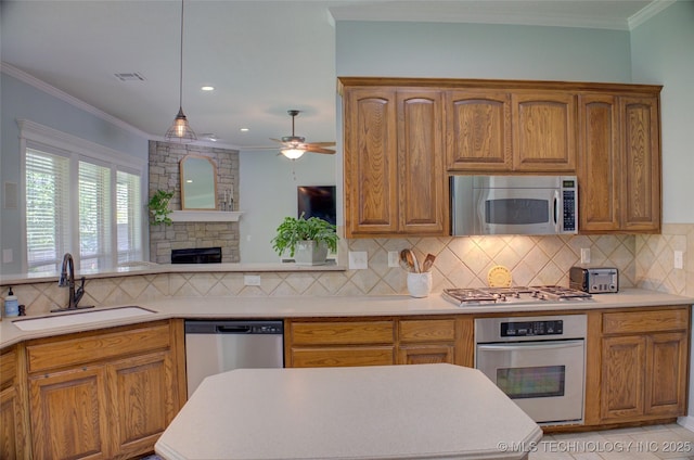 14230 S Urbana Ave, Bixby, OK 74008 - kitchen with stainless steel appliances, light countertops, backsplash, a ceiling fan, and ornamental molding