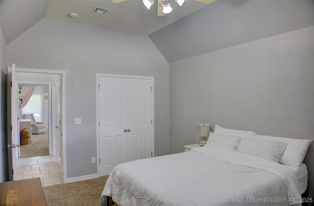 14230 S Urbana Ave, Bixby, OK 74008 - bedroom with vaulted ceiling, light colored carpet, a closet, and a ceiling fan