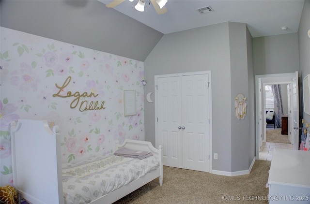 14230 S Urbana Ave, Bixby, OK 74008 - carpeted bedroom featuring vaulted ceiling, a closet, and a ceiling fan