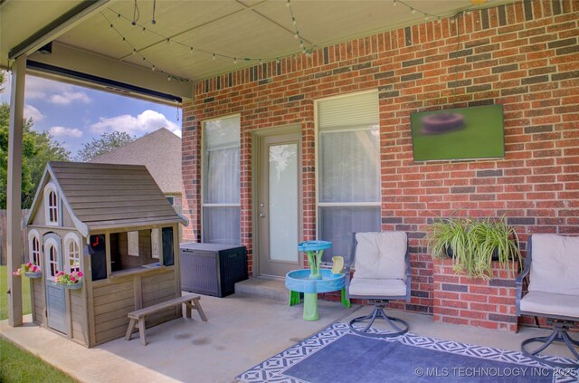 14230 S Urbana Ave, Bixby, OK 74008 - view of patio featuring an outdoor structure