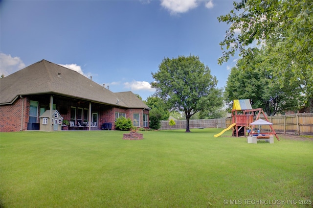 14230 S Urbana Ave, Bixby, OK 74008 - fenced backyard featuring a playground