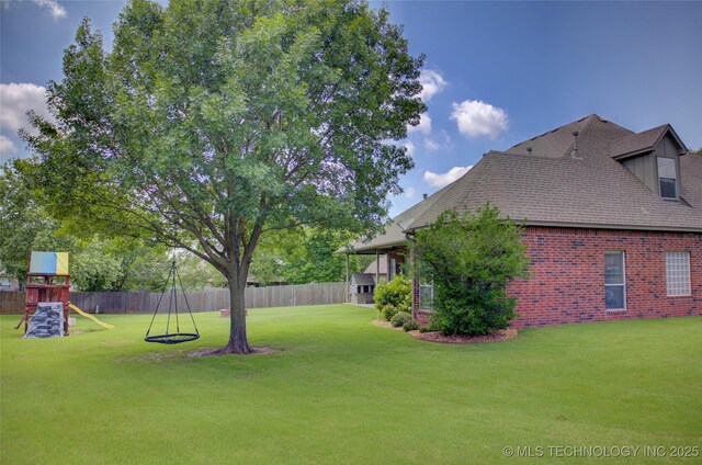 14230 S Urbana Ave, Bixby, OK 74008 - view of yard featuring a playground