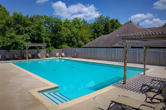 14230 S Urbana Ave, Bixby, OK 74008 - community pool featuring a pergola, a patio, and a fenced backyard