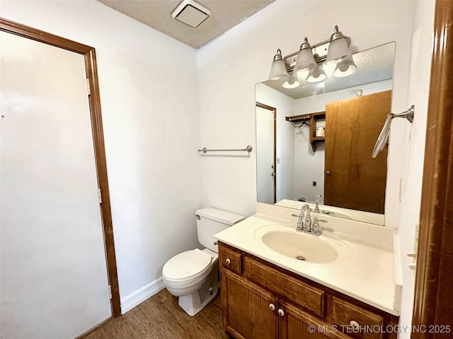 6223 S Cedar Pl, Broken Arrow, OK 74011 - bathroom with vanity and wood finished floors