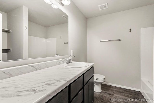 23561 E 114th Ct, Broken Arrow, OK 74014 - full bath with wood finished floors, vanity, and bathtub / shower combination