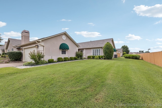 8316 E 81st Pl, Tulsa, OK 74133 - view of front facade with stucco siding, a chimney, a garage, and driveway