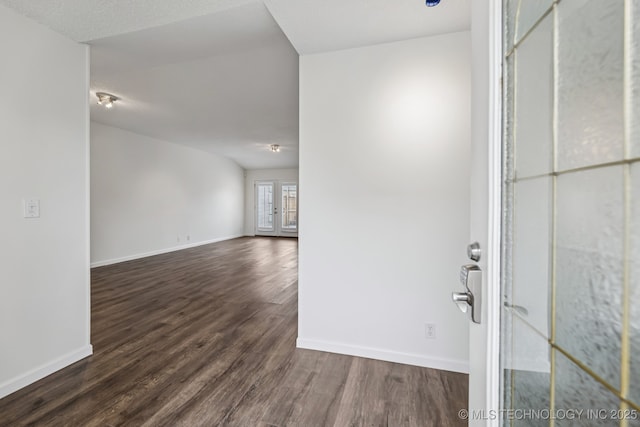 8316 E 81st Pl, Tulsa, OK 74133 - foyer entrance featuring dark wood-style flooring and baseboards