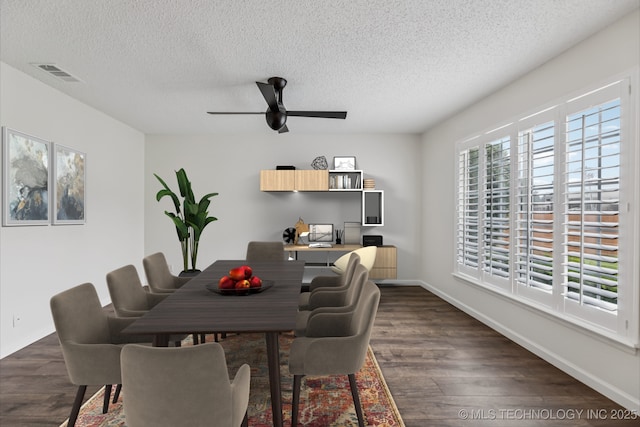 8316 E 81st Pl, Tulsa, OK 74133 - dining room with a ceiling fan, a textured ceiling, and dark wood-style flooring