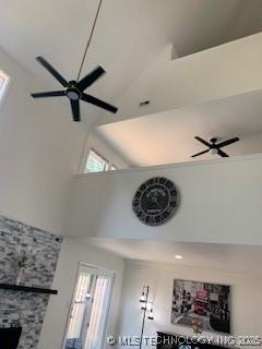 4822 S Quaker Ave, Tulsa, OK 74105 - detailed view of a ceiling fan and a stone fireplace