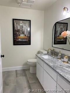 4822 S Quaker Ave, Tulsa, OK 74105 - bathroom featuring vanity and toilet