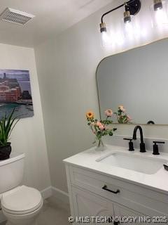 4822 S Quaker Ave, Tulsa, OK 74105 - bathroom with vanity and toilet